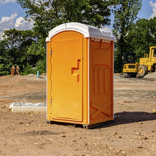 how often are the portable restrooms cleaned and serviced during a rental period in Woodston KS